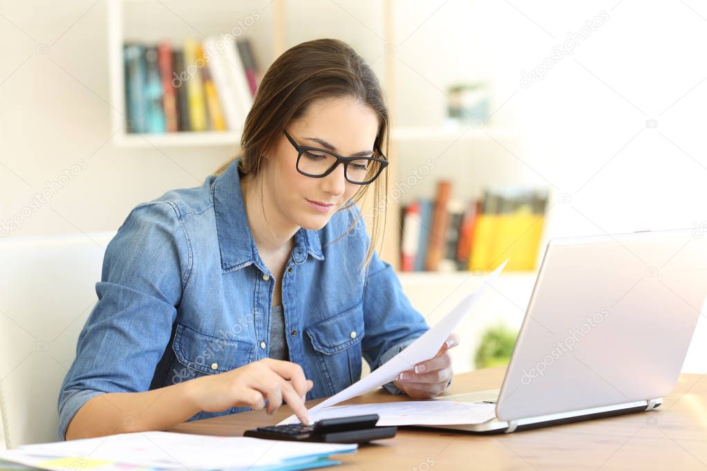 Woman doing accounting at home