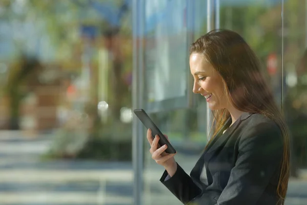 Side View Portrait Executive Checking Smart Phone Content Waiting Bus — Stock Photo, Image