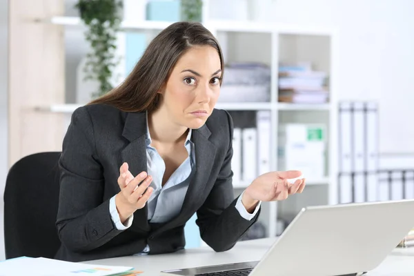 Confused Businesswoman Looking Camera Laptop Sitting Her Desk Office Royalty Free Stock Images