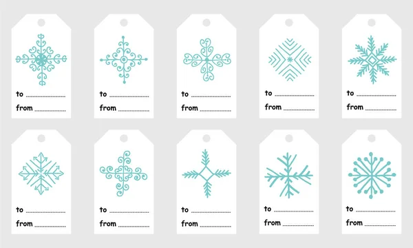 Etiquetas de Natal e Ano Novo com bonito mão neve desenhada — Vetor de Stock