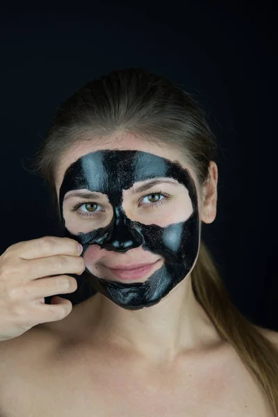 Black face mask — Stock Photo, Image