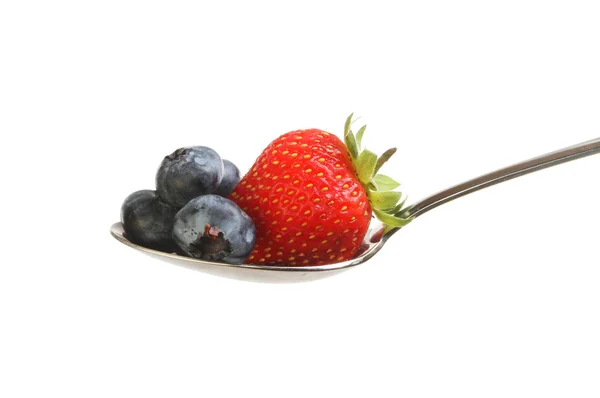 Frutta mature in un cucchiaio — Foto Stock