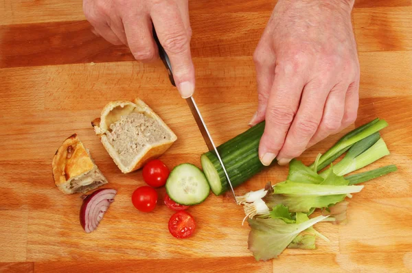 Hands preparing salad — Stock Photo, Image