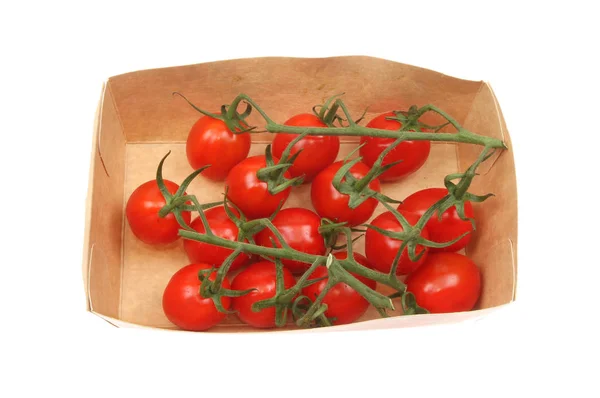 Tomatoes in a carton box — Stock Photo, Image