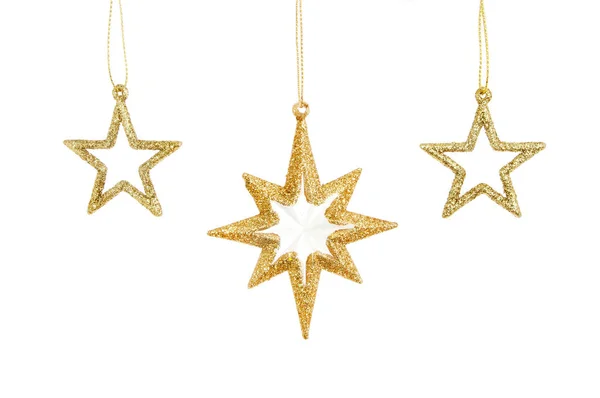 Tre guld jul stjärnor — Stockfoto