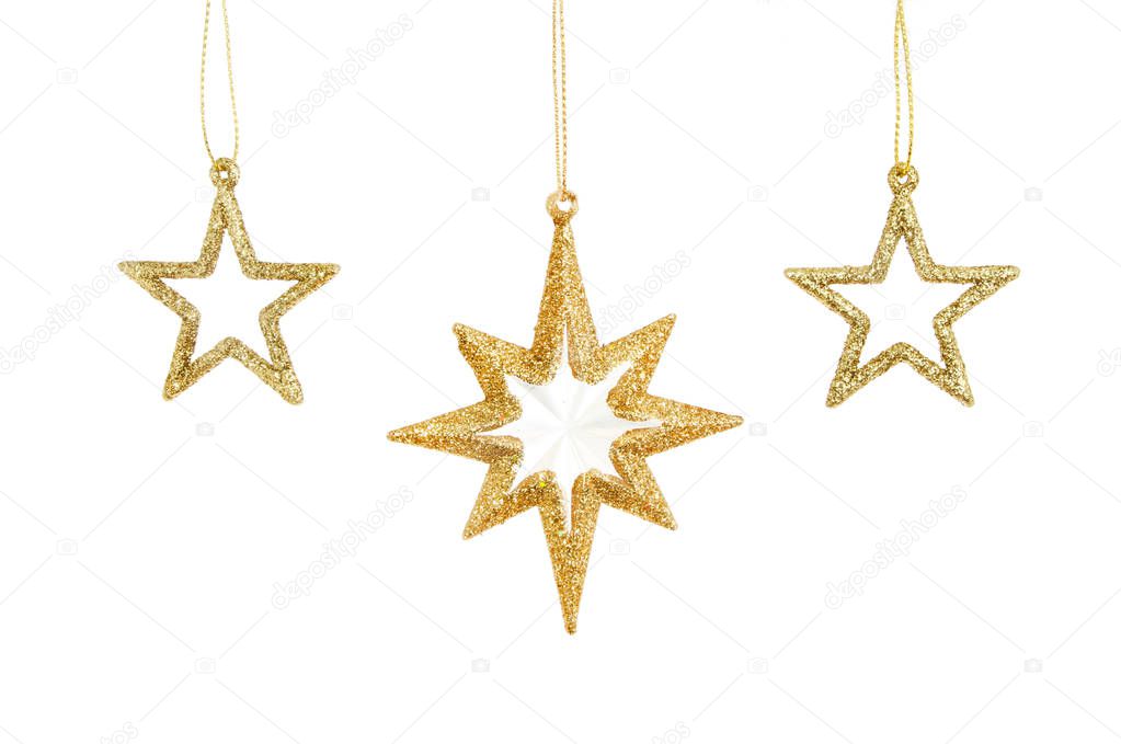 Three gold Christmas stars