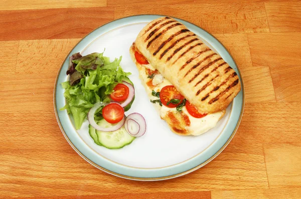 Panini and salad — Stock Photo, Image