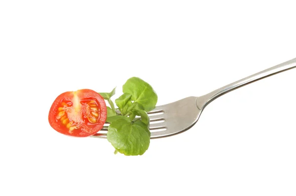 Pomidor i rzeżucha na widelcu — Zdjęcie stockowe