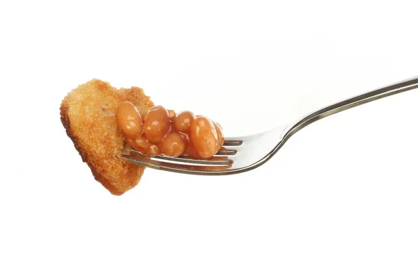 Beans on a fork — Stock Photo, Image