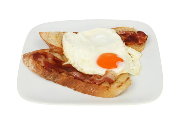 Fried egg ciabatta and pancetta — Stock Photo, Image