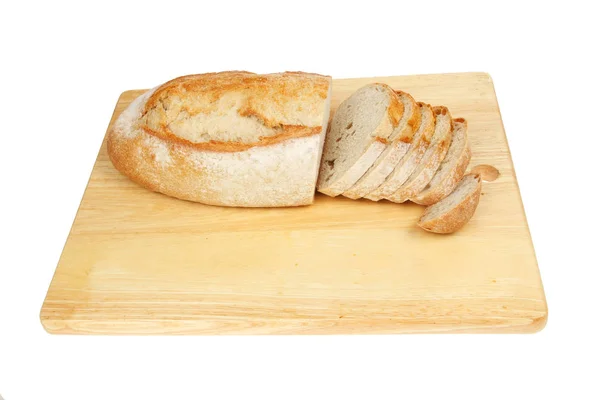 Rustic bread on a board — Stock Photo, Image