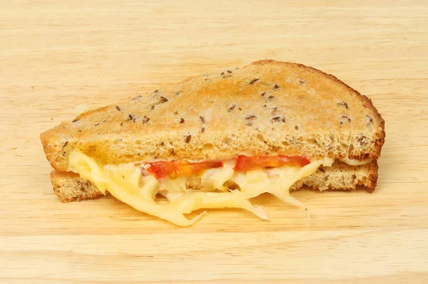 Toasted cheese sandwich on a board — Stock Photo, Image