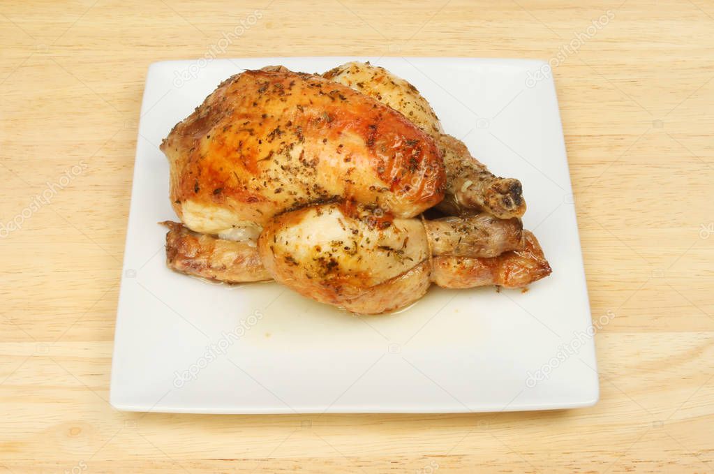 Roasted poussin on a plate