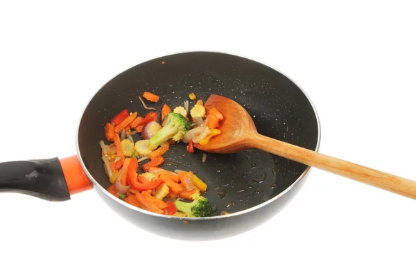 Revuelva las verduras fritas en un wok Imágenes De Stock Sin Royalties Gratis