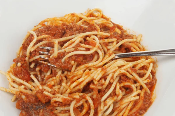 Close Van Spaghetti Bolognese Een Bord Met Een Vork — Stockfoto