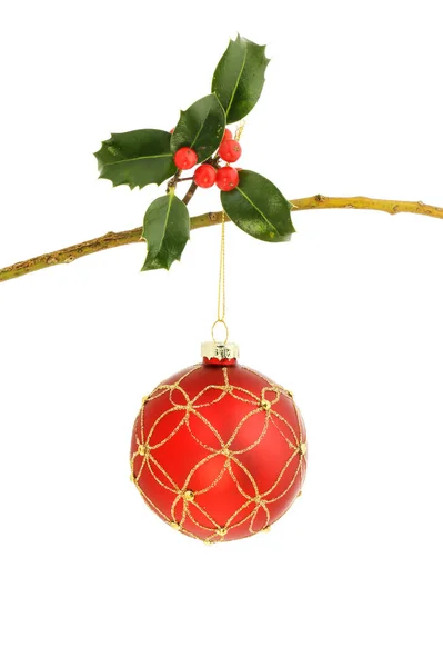 Christmas bauble and holly — Stock Photo, Image