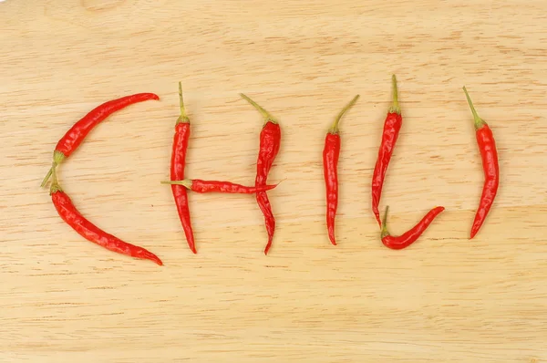 Chillies soletrar chili — Fotografia de Stock
