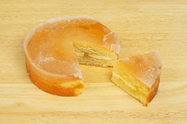 Pan Spagna Limone Con Una Fetta Tagliata Tagliere Legno — Foto Stock
