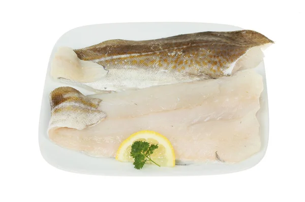 Dos Filetes Bacalao Crudos Una Placa Aislada Contra Blanco — Foto de Stock