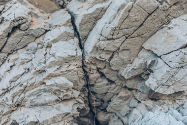 Taş kaya dokusu arka plan yüzeyi. Kaya ya da taş yüzey katmanları arka plan.