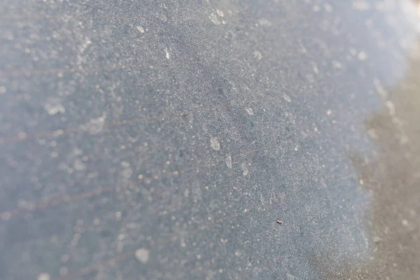 Dust on the glass texture. Dirty and dusty car window glass. Car care clean service or garage concept image
