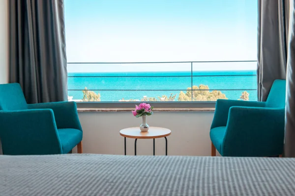 Empty Hotel or holiday resort room with view of beach and sea at summer season in Greece or Turkey