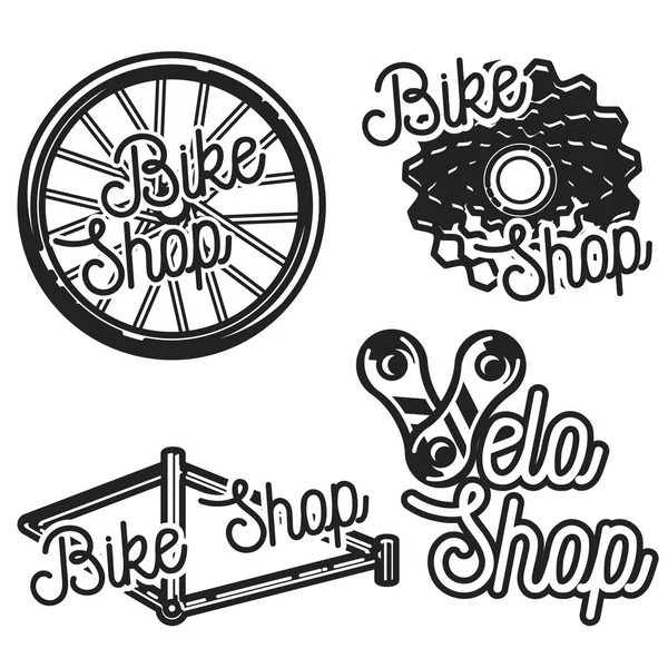 Vintage emblemas de la tienda de bicicletas — Vector de stock