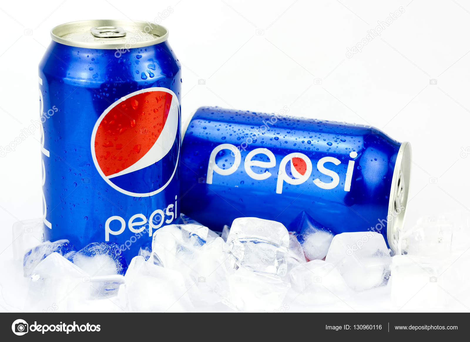 Two Pepsi Cans with ice Isolated On White Stock Editorial Photo