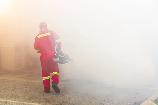 Environmental health operator fogging using chemical — Stock Photo, Image