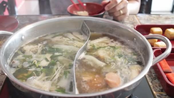 Delicious hot pot shabu meal with seafood — Stock Video