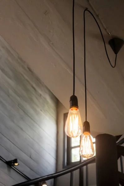 Vintage bulbs on wall background — Stock Photo, Image