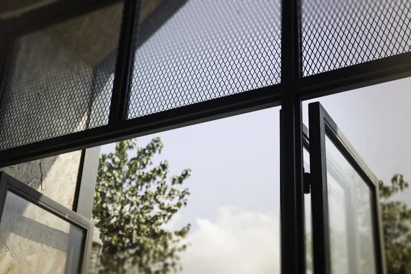 Modern loft window with natural outside view — Stock Photo, Image