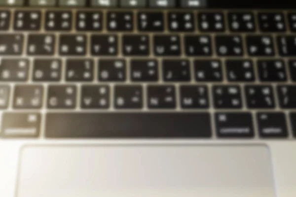 Blur laptop ou notebook teclado do computador conceito vintage — Fotografia de Stock