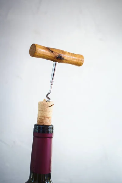 Bottle Wine with Corkscrew Grey Background — Stock Photo, Image