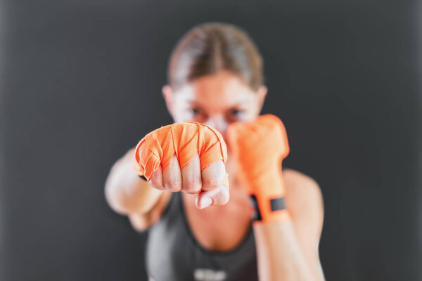 Power Female Punching With Boxing Bandage