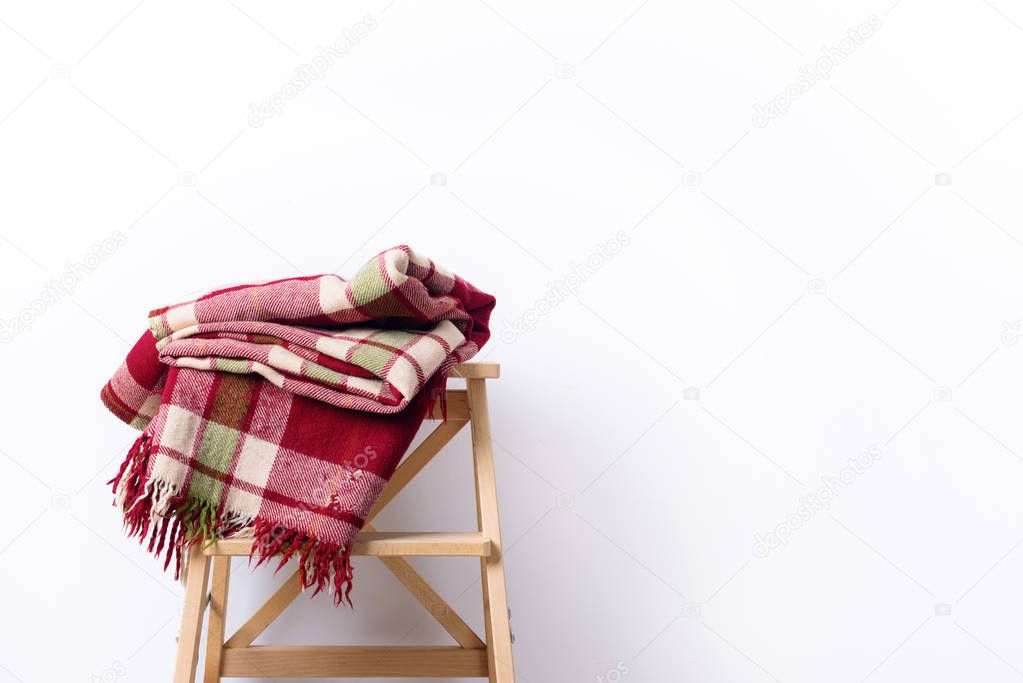 colorful tartan plaid woolen textile wooden stool