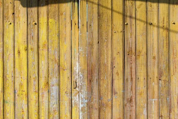 Old shabby wooden planks with cracked color paint — Stock Photo, Image