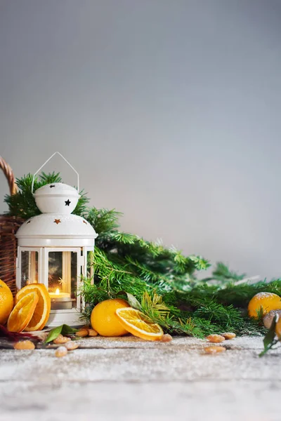 Χριστούγεννα Νέο Έτος σύνθεση πορτοκάλια καρό φως — Φωτογραφία Αρχείου
