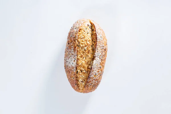 Whole grain bread with seeds light gray background — 스톡 사진