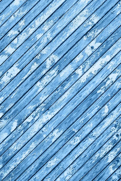 Alte Holzbohlen mit rissiger Farbe blau Trend — Stockfoto