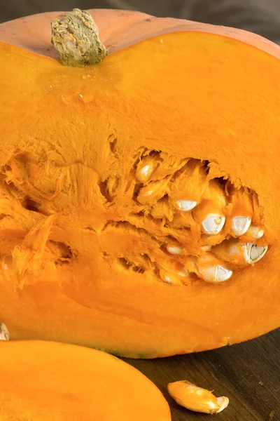 Ripe pumpkin cut in half — Stock Photo, Image