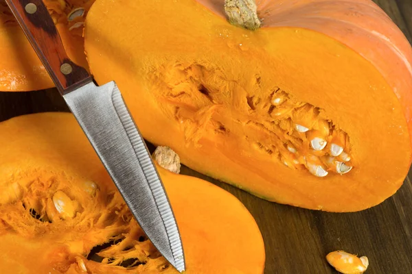 Ripe pumpkin cut in half — Stock Photo, Image