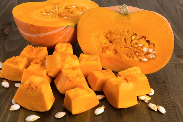 Ripe pumpkin cut into pieces — Stock Photo, Image