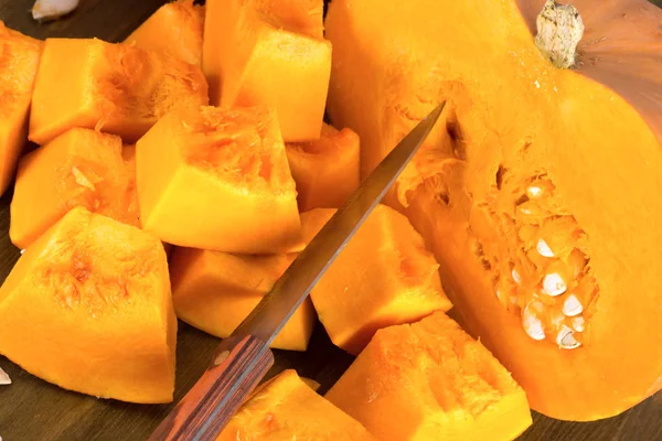 Ripe pumpkin cut into pieces — Stock Photo, Image