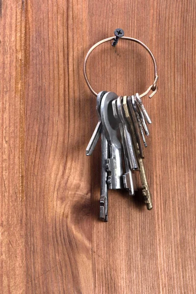 Keys hanging on a wooden wall — Stock Photo, Image