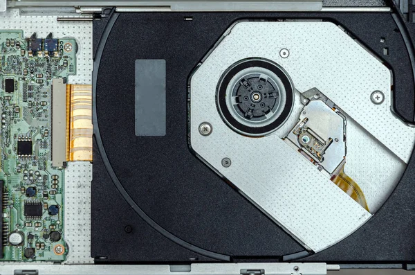 Open optical disc drive on a modern laptop computer without disc. — Stock Photo, Image