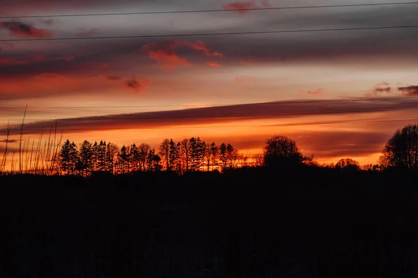 畑の向こうの夕焼け空 — ストック写真
