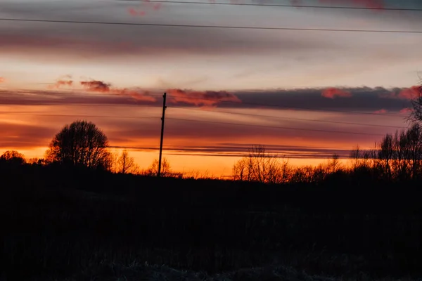 畑の向こうの夕焼け空 — ストック写真