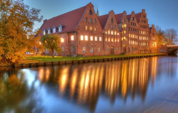 Historic brick buildings on Trave River. Lubeck, Germany — Stock Photo, Image