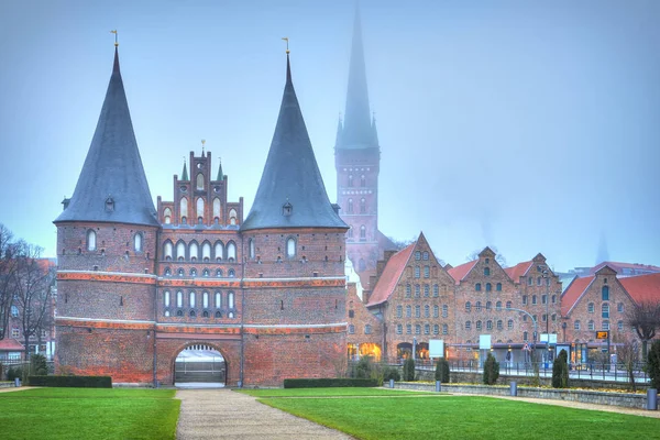 Holsten gate of Lubeck in Germany at dawn — Stock Photo, Image